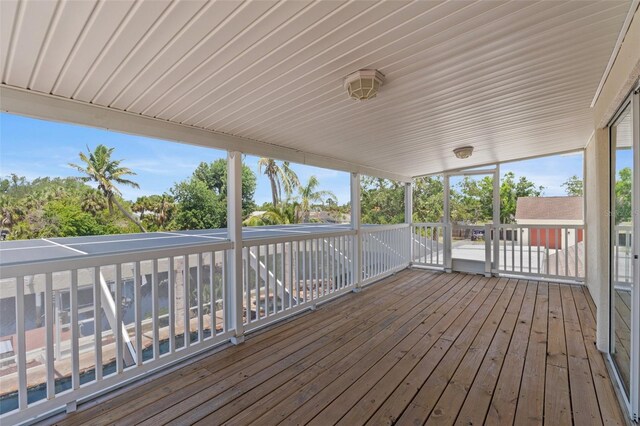 4317 Mccullough St, Port Charlotte, FL 33948 - wooden deck with view of scattered trees