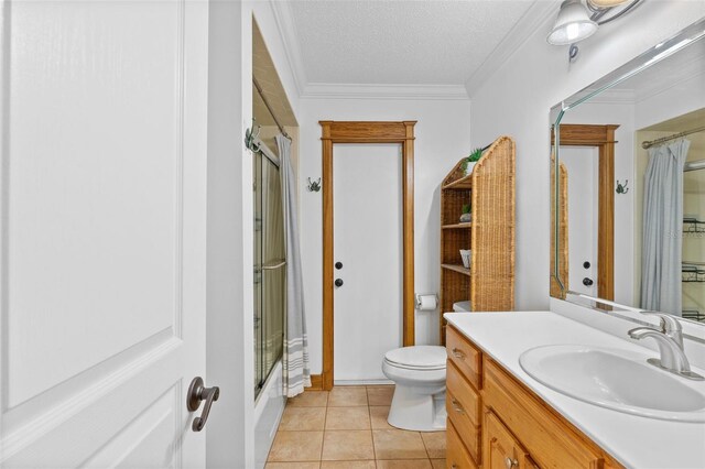4317 Mccullough St, Port Charlotte, FL 33948 - bathroom with toilet, vanity, tile patterned flooring, crown molding, and a textured ceiling