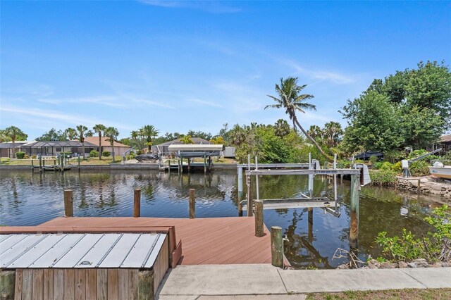 4317 Mccullough St, Port Charlotte, FL 33948 - dock area with boat lift and a water view