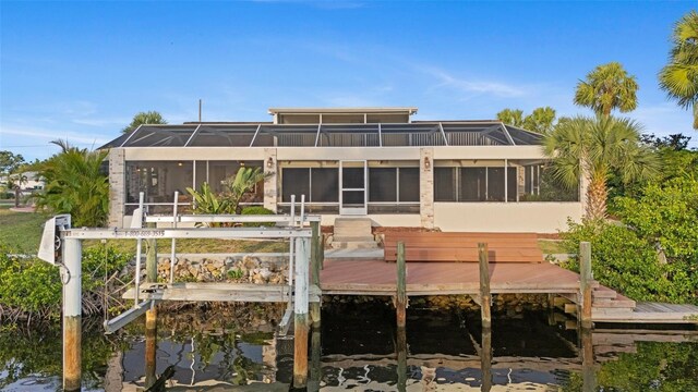 4317 Mccullough St, Port Charlotte, FL 33948 - back of property with a sunroom, a water view, and a balcony