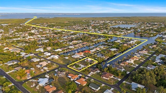 4317 Mccullough St, Port Charlotte, FL 33948 - view of property location featuring a nearby body of water, nearby suburban area, and property parcel outlined