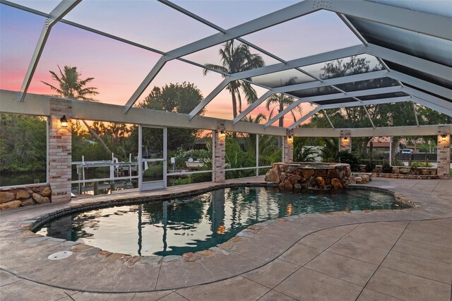 4317 Mccullough St, Port Charlotte, FL 33948 - view of swimming pool with a patio, glass enclosure, and a pool with connected hot tub