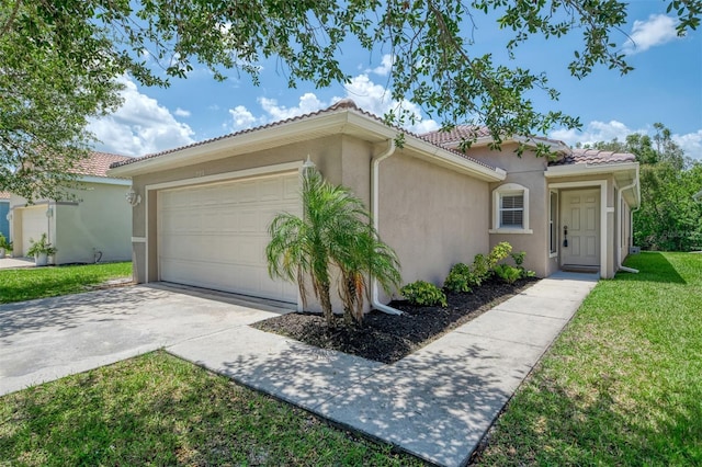 13210 SW Pembroke Cir N, Lake Suzy, FL 34269 - view of front of home with a tiled roof, a garage, stucco siding, concrete driveway, and a front lawn