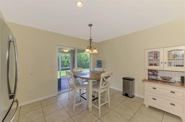 13210 SW Pembroke Cir N, Lake Suzy, FL 34269 - dining space featuring baseboards and light tile patterned floors