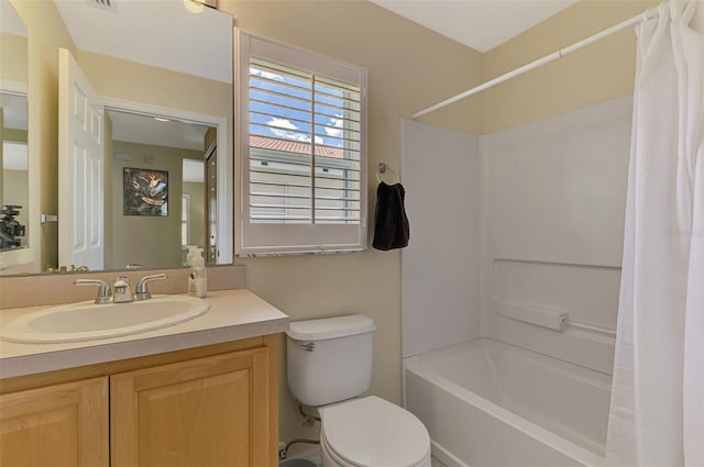 13210 SW Pembroke Cir N, Lake Suzy, FL 34269 - bathroom with toilet, shower / tub combo, and vanity