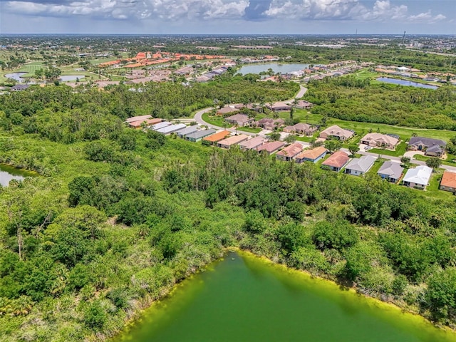 13210 SW Pembroke Cir N, Lake Suzy, FL 34269 - aerial view of residential area featuring a large body of water