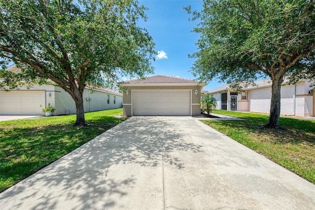13210 SW Pembroke Cir N, Lake Suzy, FL 34269 - view of front of property featuring stucco siding, driveway, a front lawn, and a tile roof