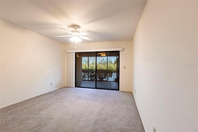 3256 White Ibis Ct Unit 24A, Punta Gorda, FL 33950 - spare room with carpet flooring, a ceiling fan, and baseboards