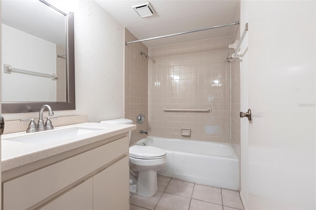 3256 White Ibis Ct Unit 24A, Punta Gorda, FL 33950 - bathroom featuring shower / tub combination, vanity, tile patterned floors, and toilet