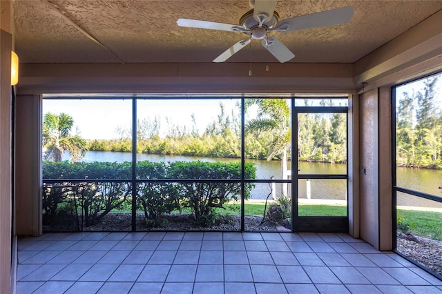 3256 White Ibis Ct Unit 24A, Punta Gorda, FL 33950 - unfurnished sunroom with a water view and ceiling fan