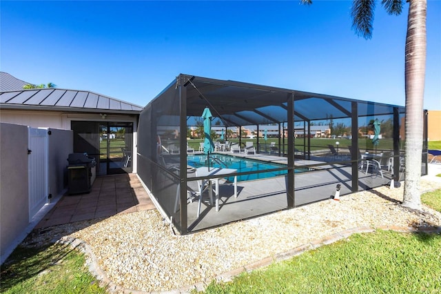 3256 White Ibis Ct Unit 24A, Punta Gorda, FL 33950 - view of pool featuring a patio, grilling area, and a lanai