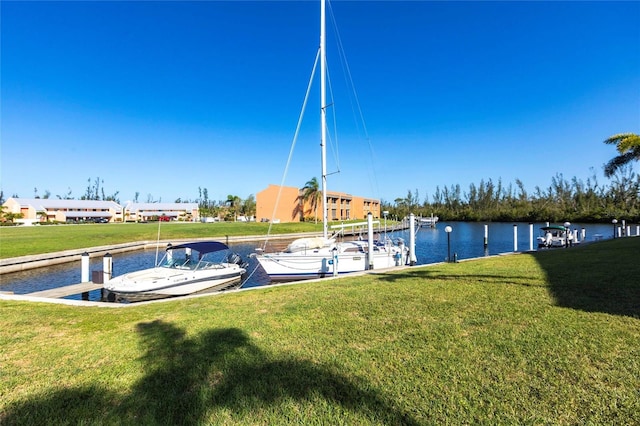 3256 White Ibis Ct Unit 24A, Punta Gorda, FL 33950 - dock with a water view and a yard