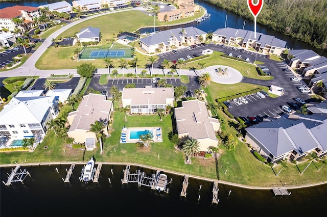 3256 White Ibis Ct Unit 24A, Punta Gorda, FL 33950 - aerial view of property and surrounding area featuring a large body of water and nearby suburban area