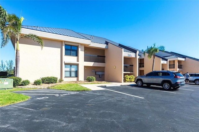3256 White Ibis Ct Unit 24A, Punta Gorda, FL 33950 - view of property with uncovered parking