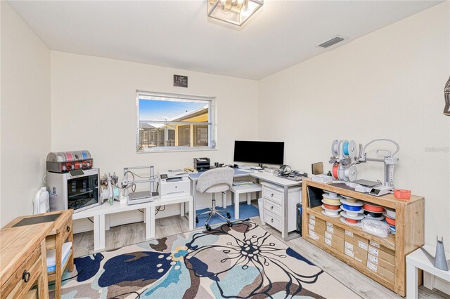 25379 Paladin Ln, Punta Gorda, FL 33983 - home office with light wood-style floors