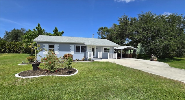2805 Gussie St, Punta Gorda, FL 33950 - view of front of property featuring a front lawn, concrete driveway, and a porch