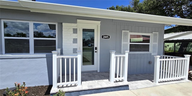 2805 Gussie St, Punta Gorda, FL 33950 - view of exterior entry with a porch