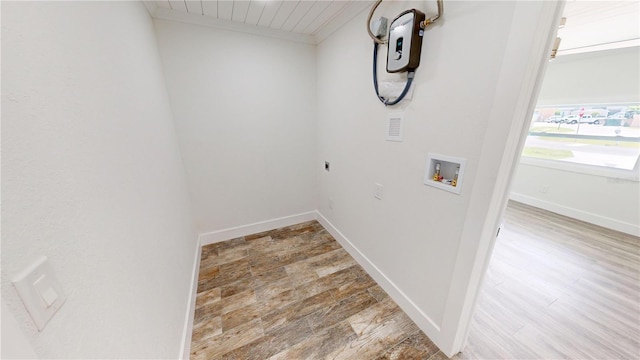2805 Gussie St, Punta Gorda, FL 33950 - washroom featuring washer hookup, hookup for an electric dryer, wood finished floors, and baseboards