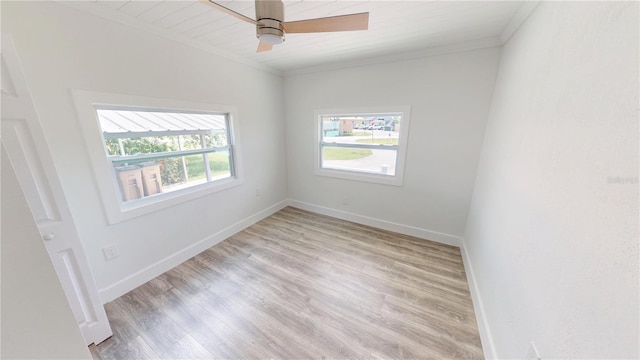 2805 Gussie St, Punta Gorda, FL 33950 - spare room featuring ornamental molding, light wood-style floors, baseboards, and a ceiling fan