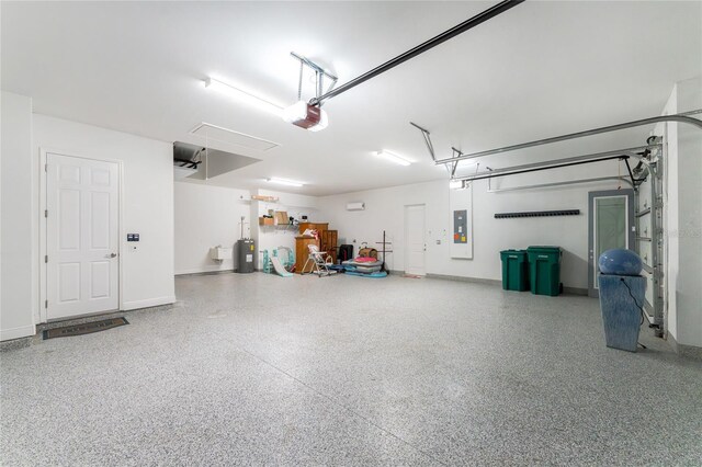 1025 Cheshire St, Port Charlotte, FL 33953 - garage featuring a garage door opener, electric panel, and water heater