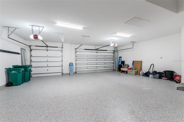 1025 Cheshire St, Port Charlotte, FL 33953 - garage featuring a garage door opener