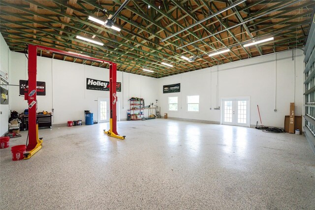 1025 Cheshire St, Port Charlotte, FL 33953 - garage featuring french doors