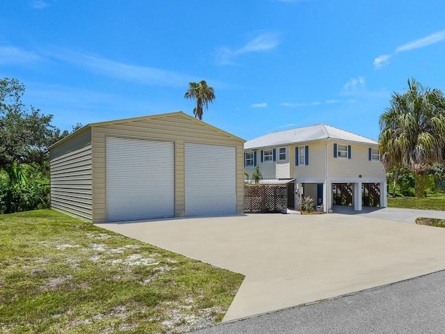 3616 Allapatchee Dr, Punta Gorda, FL 33950 - view of front of house with an outbuilding and a detached garage