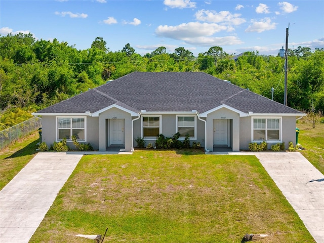 27237 Partin Dr, Punta Gorda, FL 33983 - view of front of house featuring stucco siding and a shingled roof