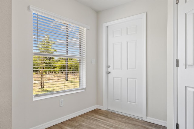 27237 Partin Dr, Punta Gorda, FL 33983 - entrance foyer with wood finished floors and baseboards