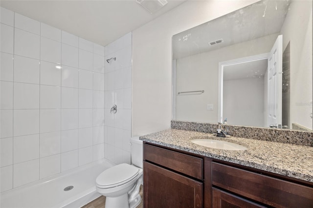 27237 Partin Dr, Punta Gorda, FL 33983 - full bath featuring vanity, a tile shower, and toilet