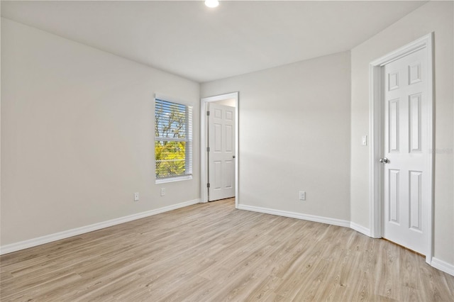 27237 Partin Dr, Punta Gorda, FL 33983 - unfurnished bedroom with light wood finished floors, baseboards, and recessed lighting