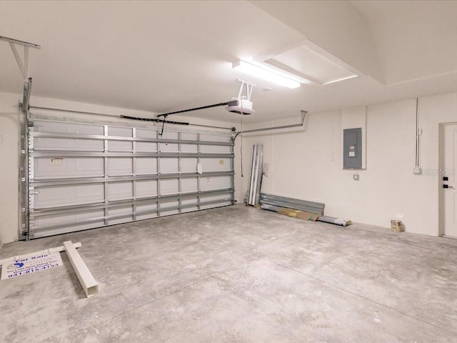 17130 Elder St, Port Charlotte, FL 33954 - garage with electric panel and a garage door opener