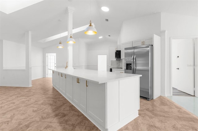 19723 Midway Blvd, Port Charlotte, FL 33948 - kitchen with appliances with stainless steel finishes, lofted ceiling, light countertops, recessed lighting, and decorative light fixtures