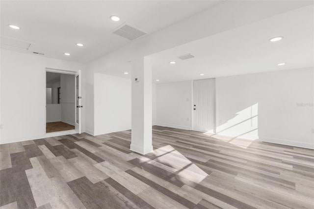 19723 Midway Blvd, Port Charlotte, FL 33948 - spare room featuring recessed lighting, wood finished floors, and baseboards