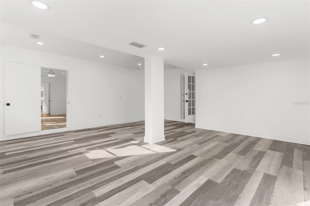 19723 Midway Blvd, Port Charlotte, FL 33948 - below grade area featuring recessed lighting and wood finished floors