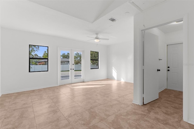 19723 Midway Blvd, Port Charlotte, FL 33948 - empty room featuring light tile patterned flooring, a ceiling fan, and french doors