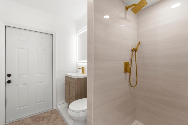 19723 Midway Blvd, Port Charlotte, FL 33948 - bathroom with a tile shower, vanity, and toilet