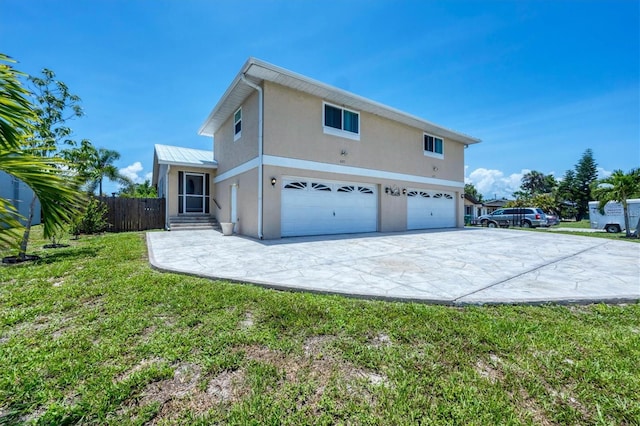 3105/3109 Vasco St, Punta Gorda, FL 33950 - view of side of home featuring an attached garage, stucco siding, concrete driveway, and entry steps