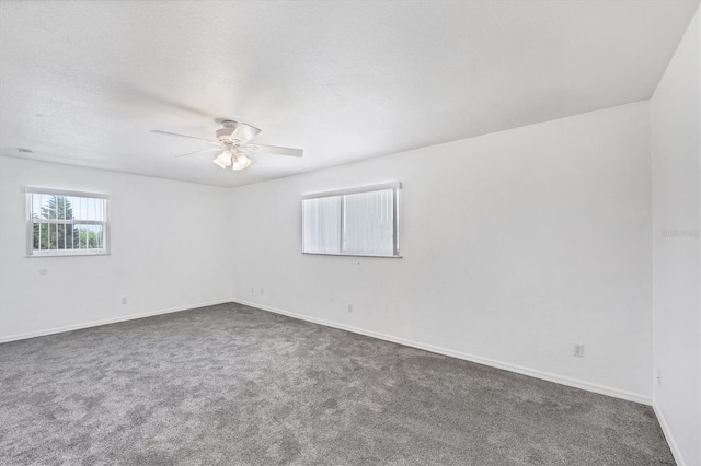 3105/3109 Vasco St, Punta Gorda, FL 33950 - unfurnished room featuring dark carpet and ceiling fan