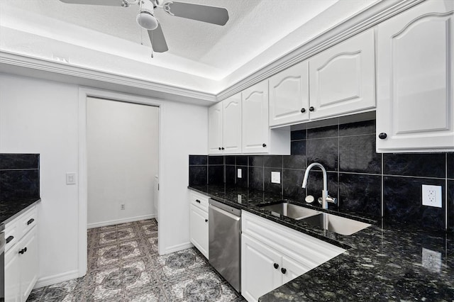 3105/3109 Vasco St, Punta Gorda, FL 33950 - kitchen featuring stainless steel dishwasher, tasteful backsplash, dark stone countertops, white cabinets, and a textured ceiling