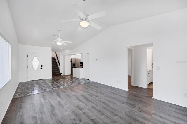 3105/3109 Vasco St, Punta Gorda, FL 33950 - unfurnished living room featuring lofted ceiling, ceiling fan, wood finished floors, and stairs