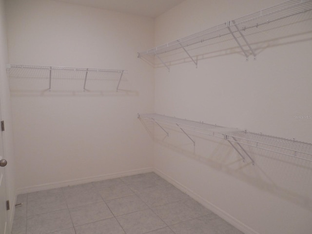 4830 Cazes Ave, North Port, FL 34287 - walk in closet featuring light tile patterned flooring
