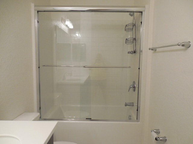 4830 Cazes Ave, North Port, FL 34287 - bathroom with toilet, vanity, and enclosed tub / shower combo