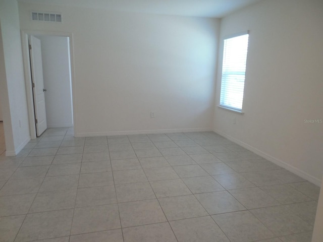4830 Cazes Ave, North Port, FL 34287 - spare room featuring light tile patterned floors and baseboards