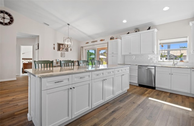 16094 Ortega Dr, Punta Gorda, FL 33955 - kitchen featuring dishwasher, lofted ceiling, a chandelier, a kitchen island, and dark wood finished floors