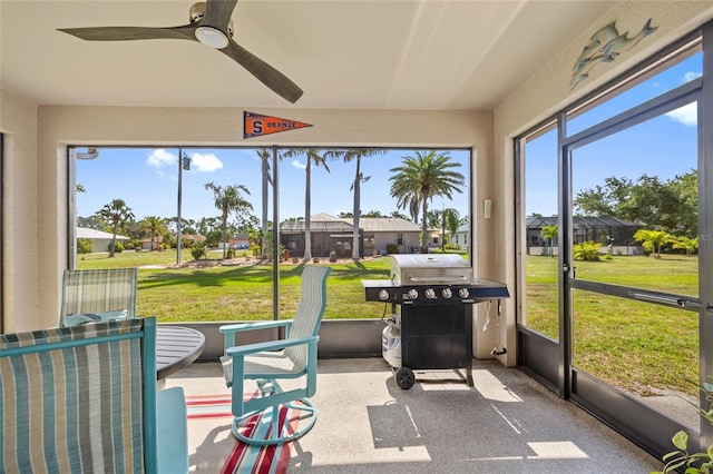 16094 Ortega Dr, Punta Gorda, FL 33955 - sunroom with a ceiling fan and a residential view