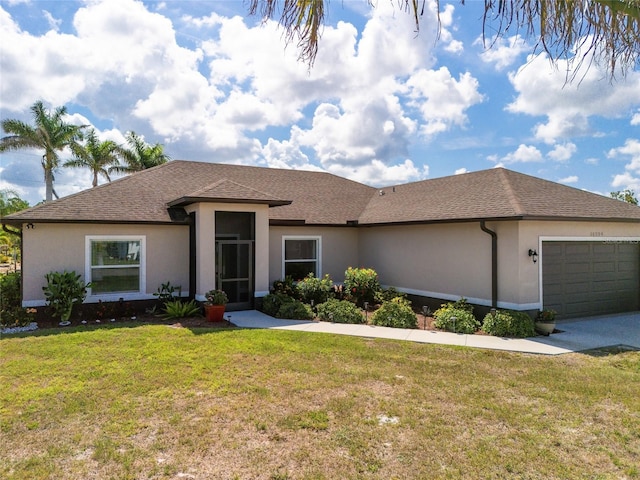 16094 Ortega Dr, Punta Gorda, FL 33955 - view of front of property with stucco siding, a front yard, a garage, and driveway