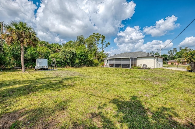 4044 S Salford Blvd, North Port, FL 34287 - view of grassy yard featuring a sunroom
