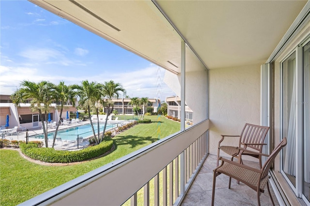 1080 Bal Harbor Blvd Unit 12C, Punta Gorda, FL 33950 - balcony featuring view of pool area and baseboard heating