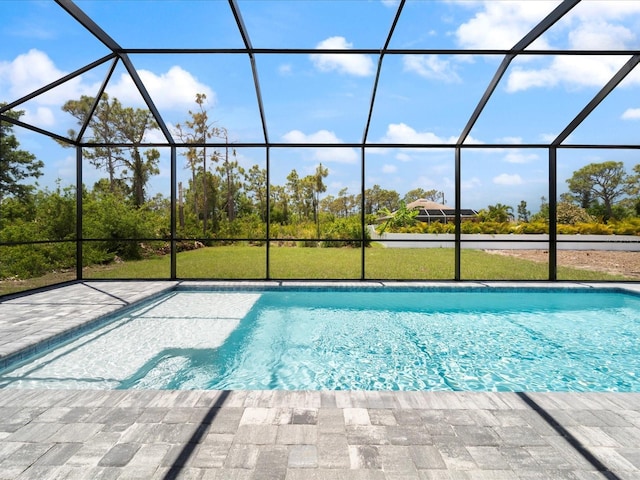 223 Australian Dr, Rotonda West, FL 33947 - outdoor pool featuring glass enclosure